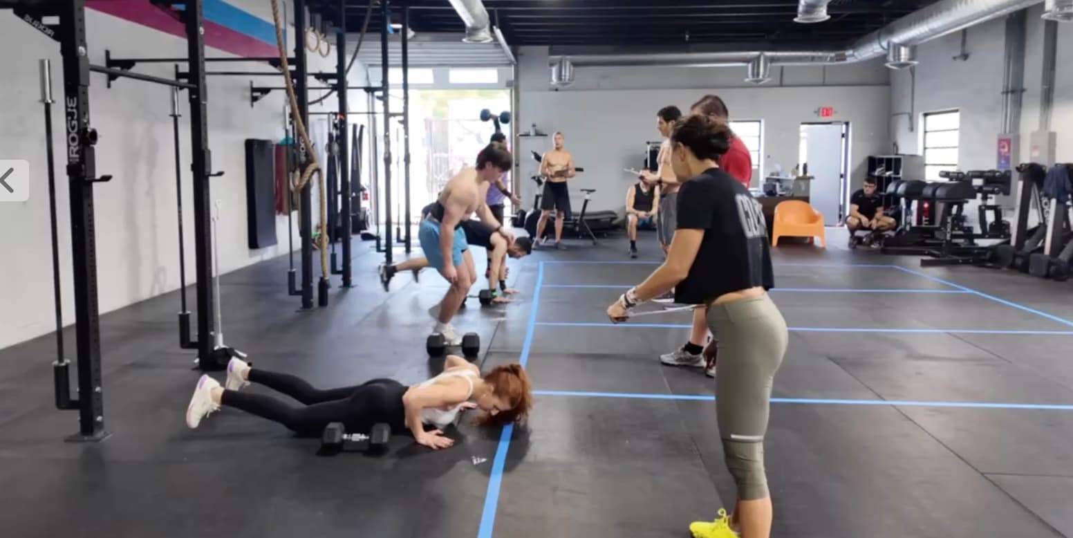 Coach-led group conditioning class in progress at Wynwood Fitness Club in Miami
